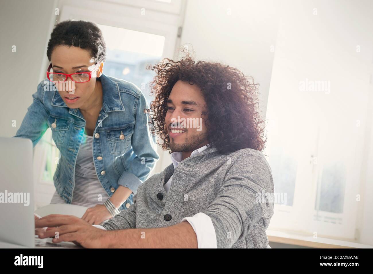 Couple using laptop Stock Photo