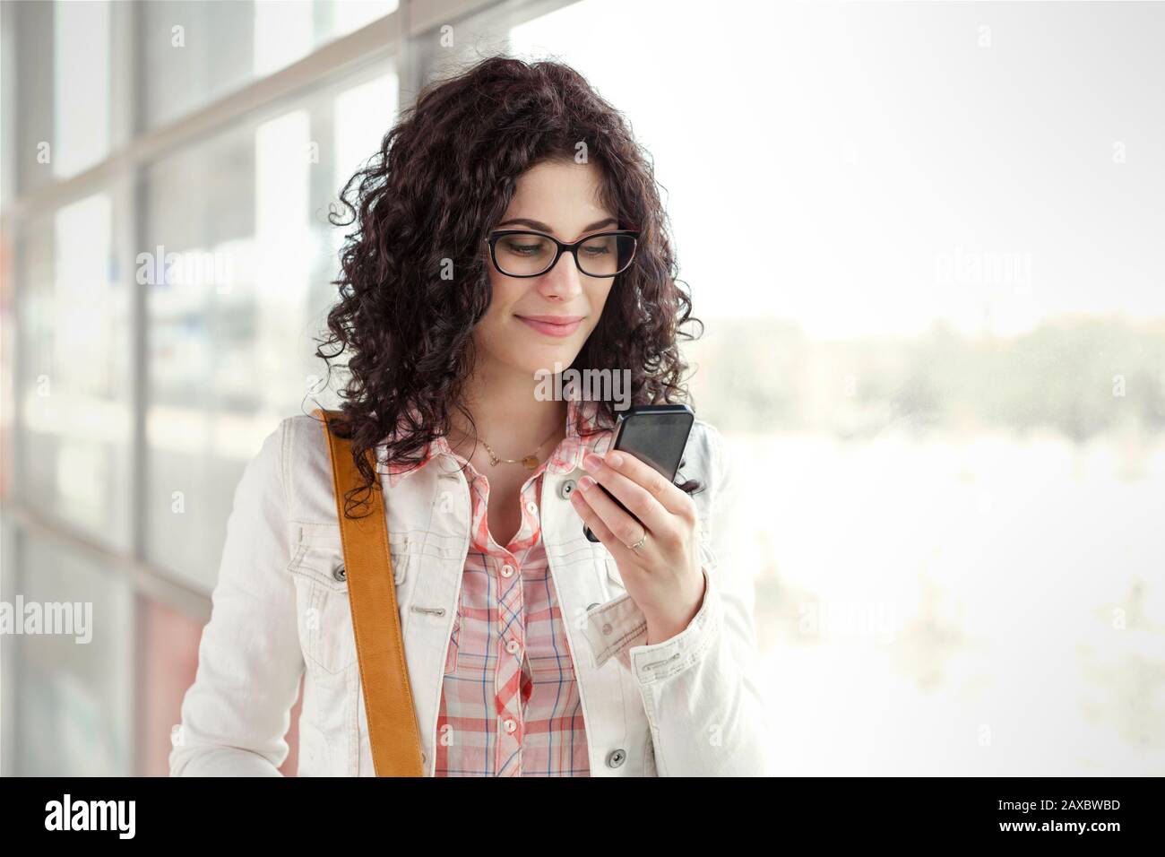 Young smart woman reading hi-res stock photography and images - Alamy