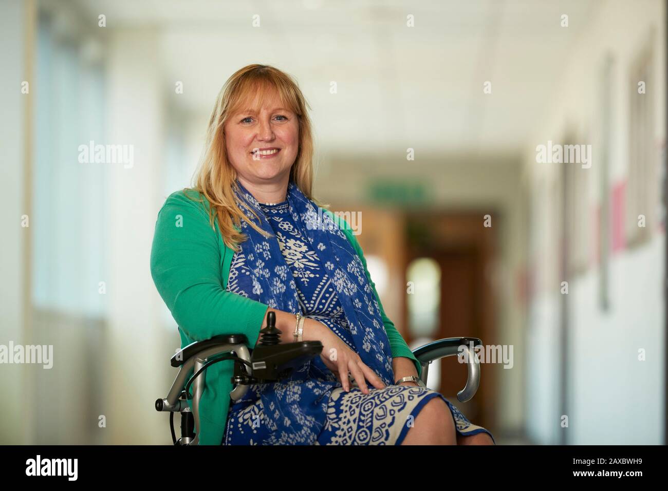 Woman in wheelchair hi-res stock photography and images - Alamy