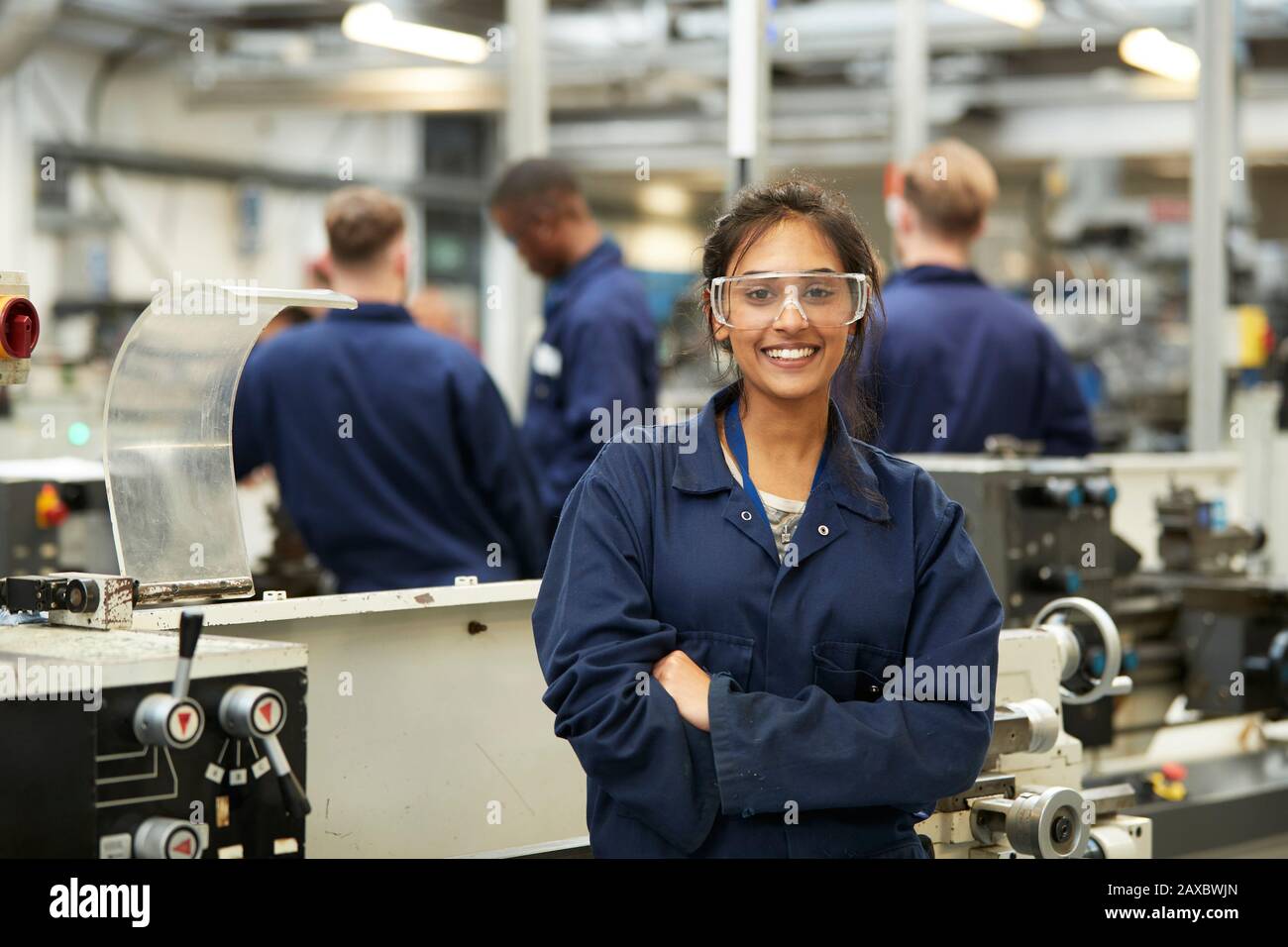 Portrait confident young female college student in shop class Stock Photo