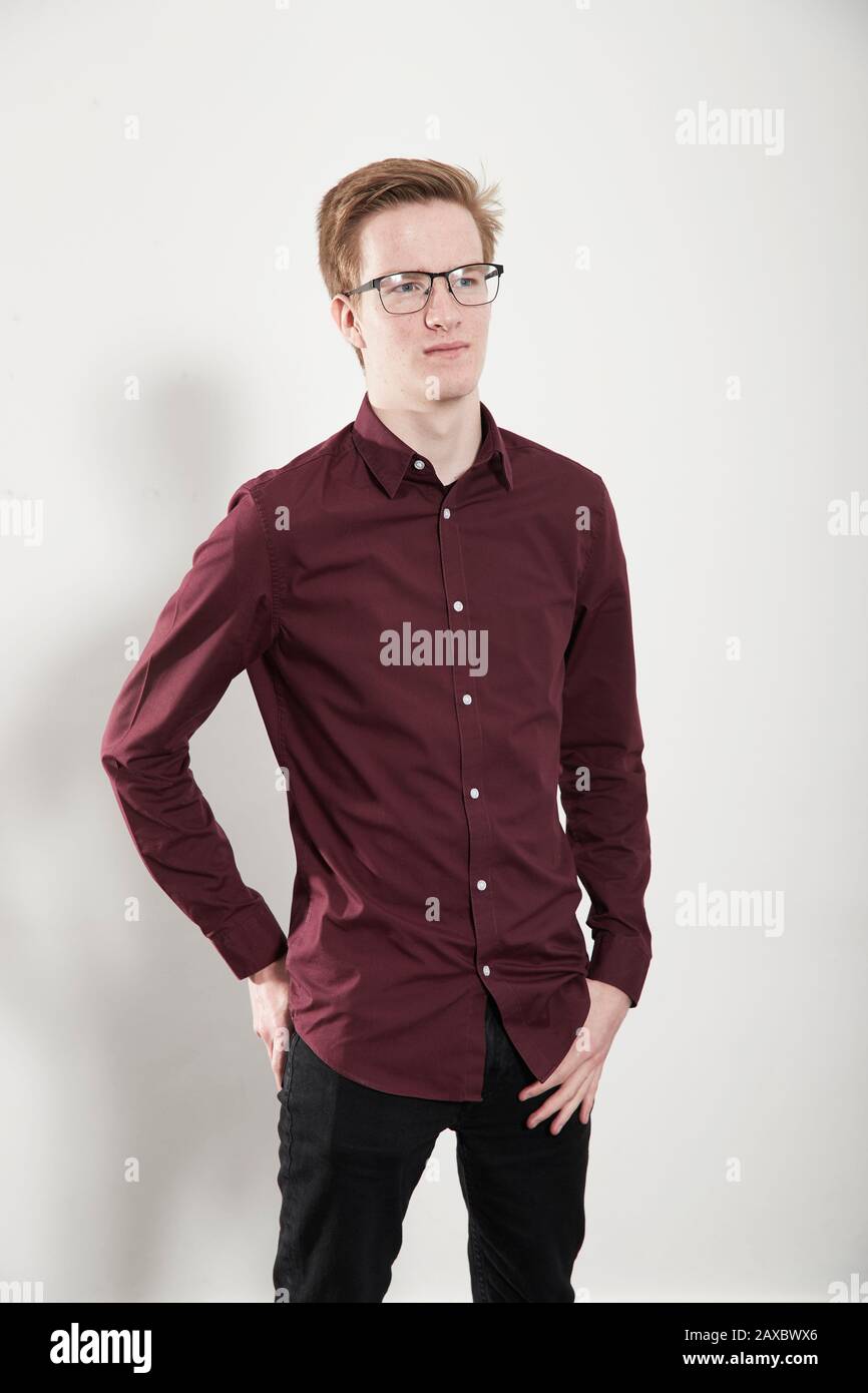 Portrait confident young man looking away Stock Photo