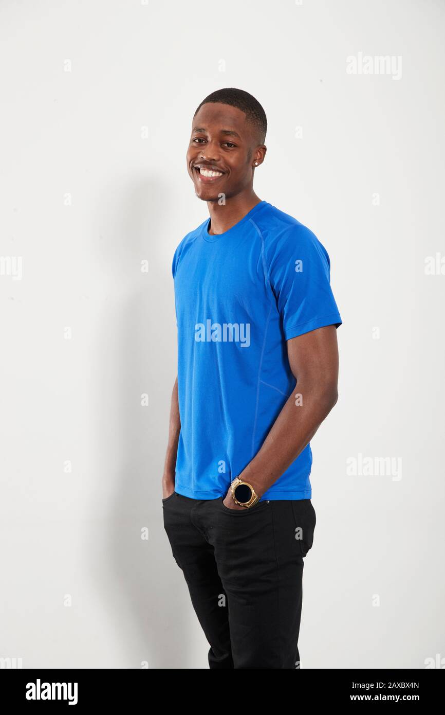 Portrait happy young man in blue t-shirt Stock Photo
