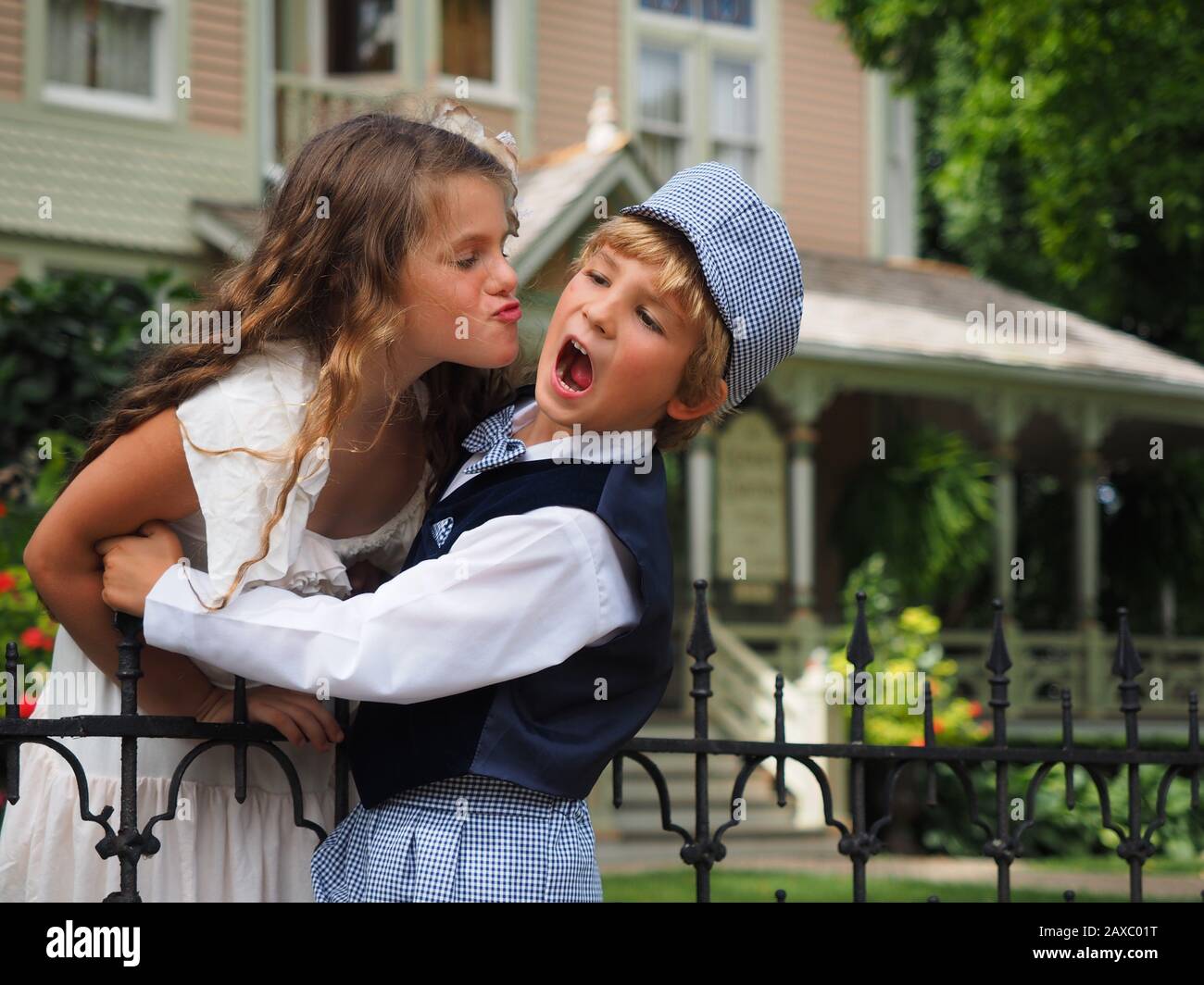 Girl trying kiss boy boy hi-res stock photography and images - Alamy