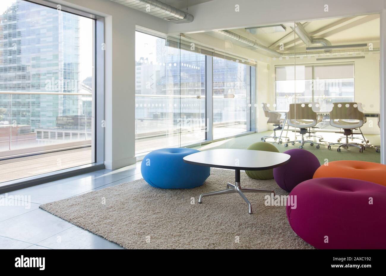 Creative open plan office space with bean bag chairs Stock Photo
