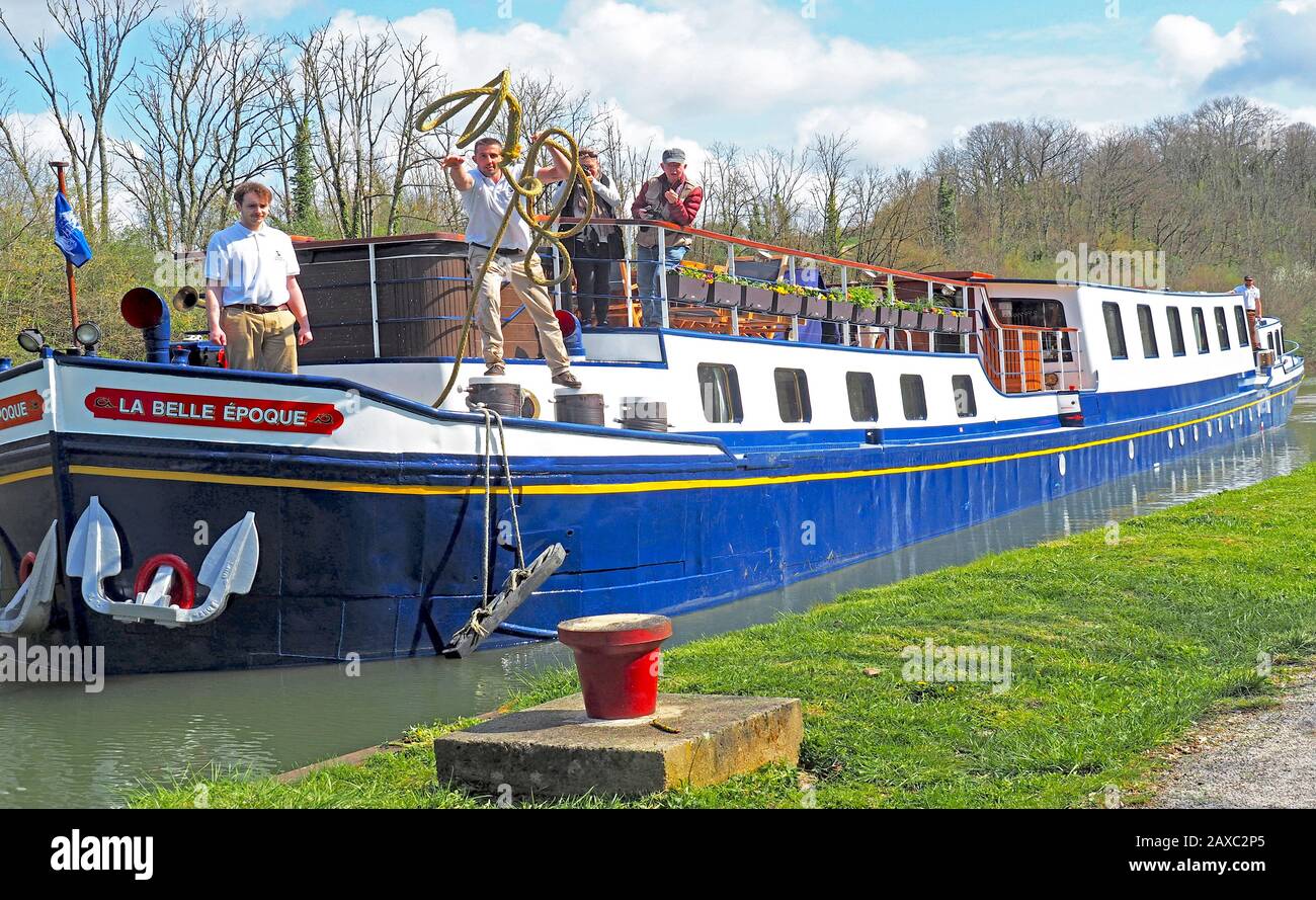 European Waterways luxury barge La Belle Epoque cruising on the Burgundy Canal (Canal de Bourgogne) in France. Stock Photo