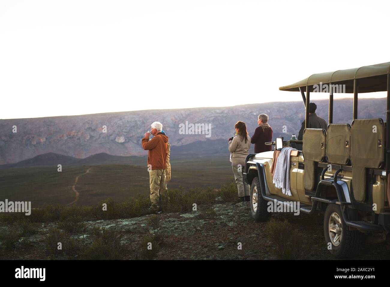 Safari tour group enjoying landscape view South Africa Stock Photo