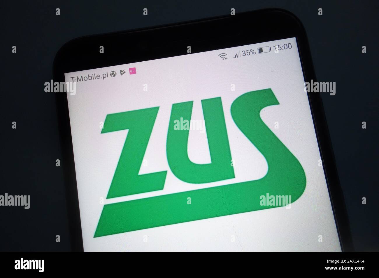 ZUS (Polish: Zaklad Ubezpieczen Spolecznych) logo on smartphone Stock Photo