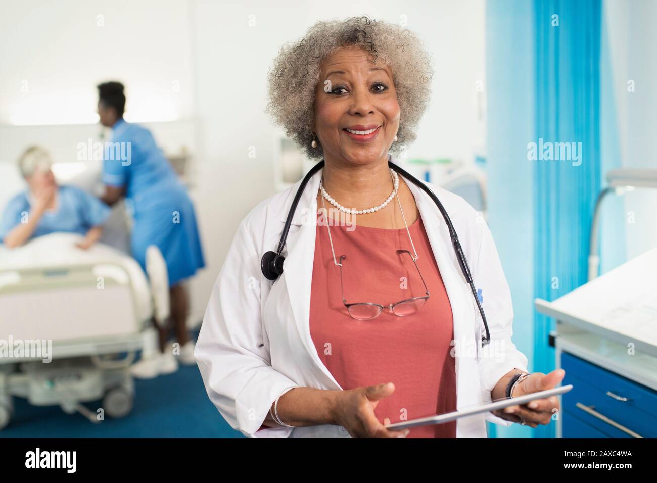Senior female doctor using hi-res stock photography and images - Alamy