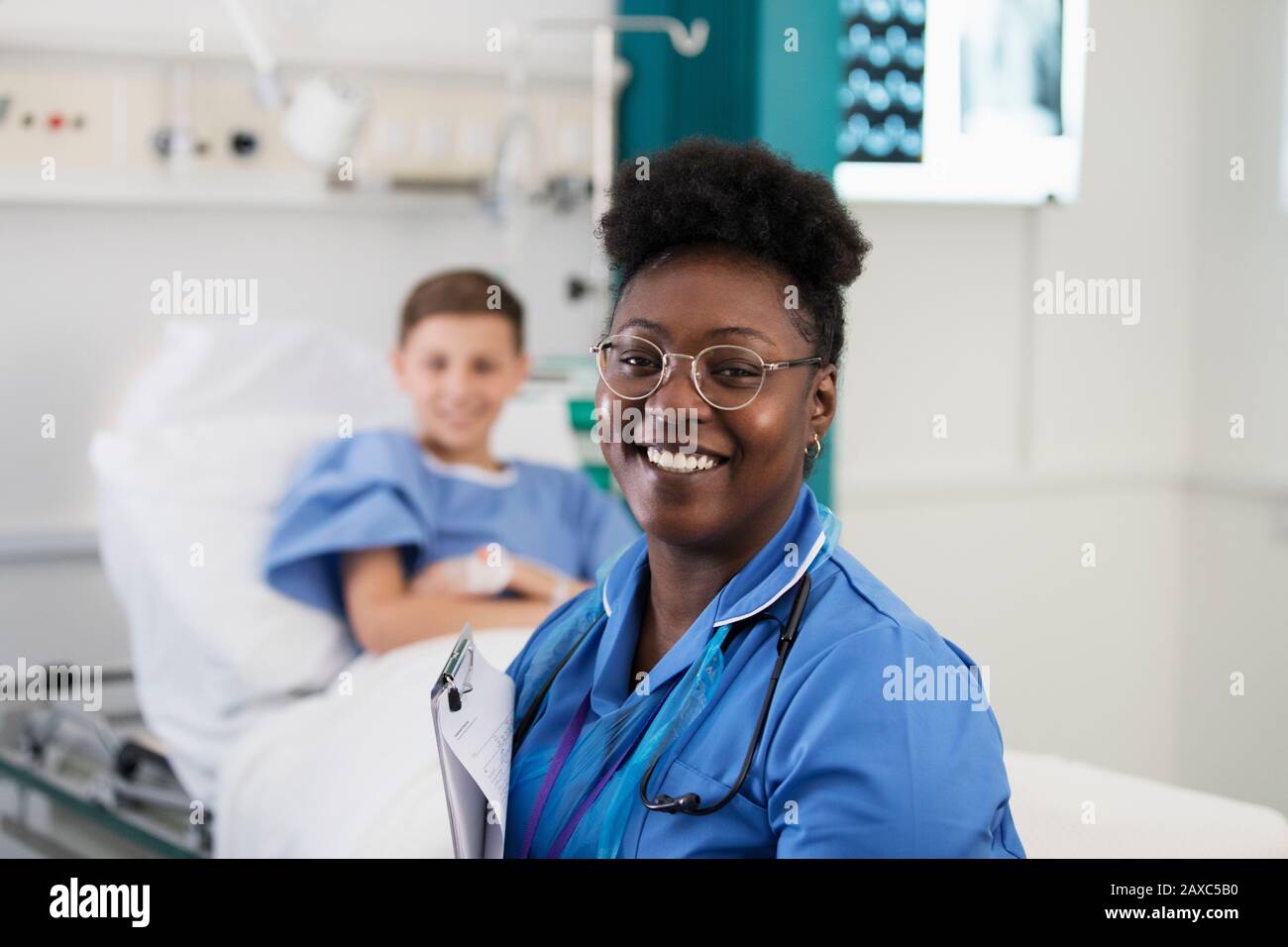 Portrait confident female nurse in hospital room Stock Photo - Alamy