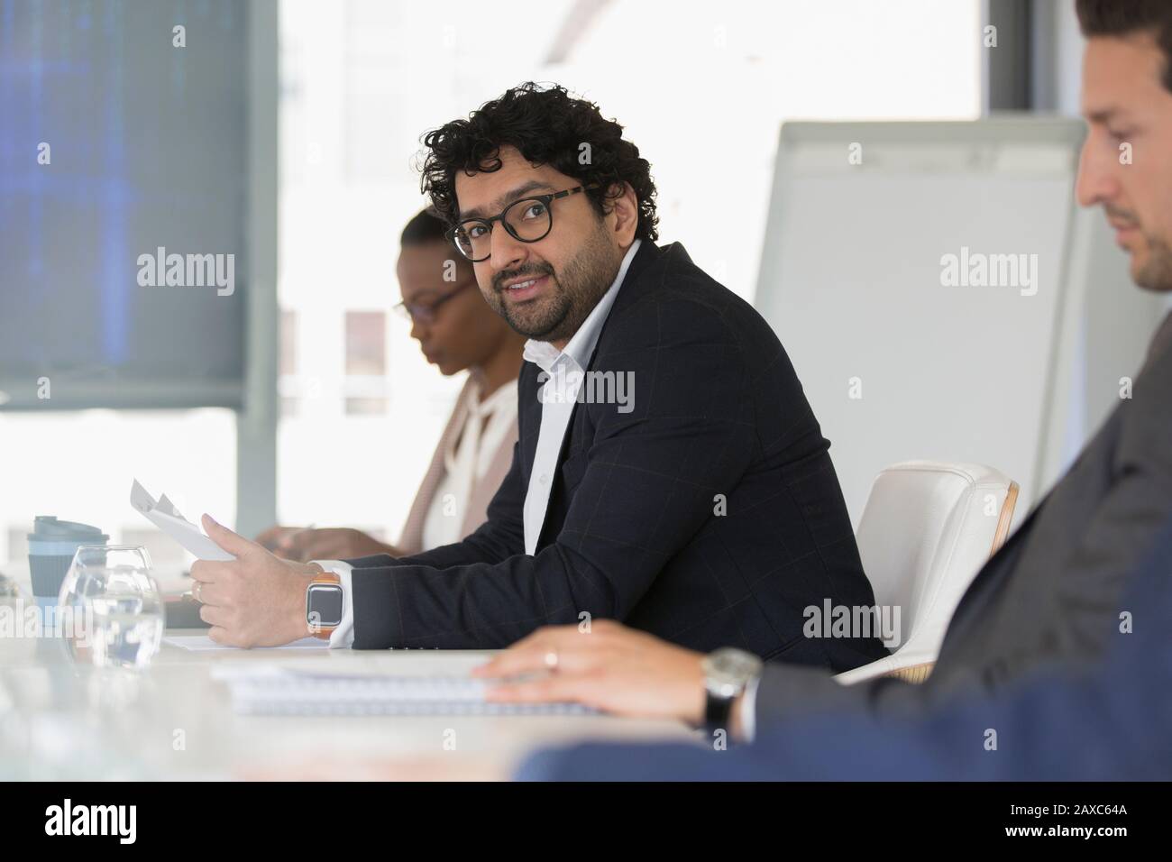 Portrait confident businessman in conference room meeting Stock Photo