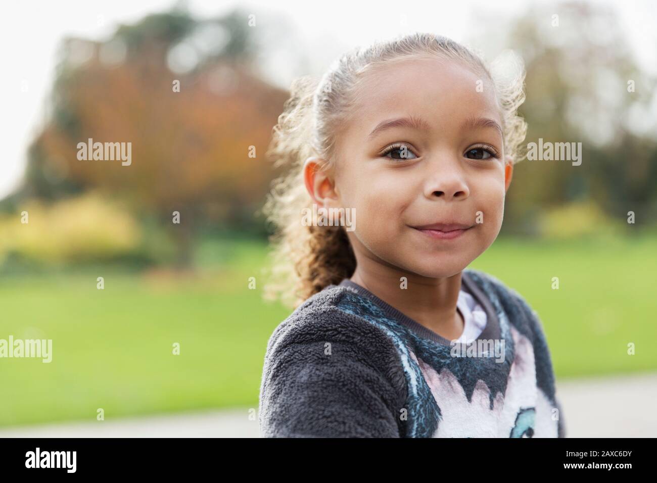 Portrait confident, smiling girl Stock Photo