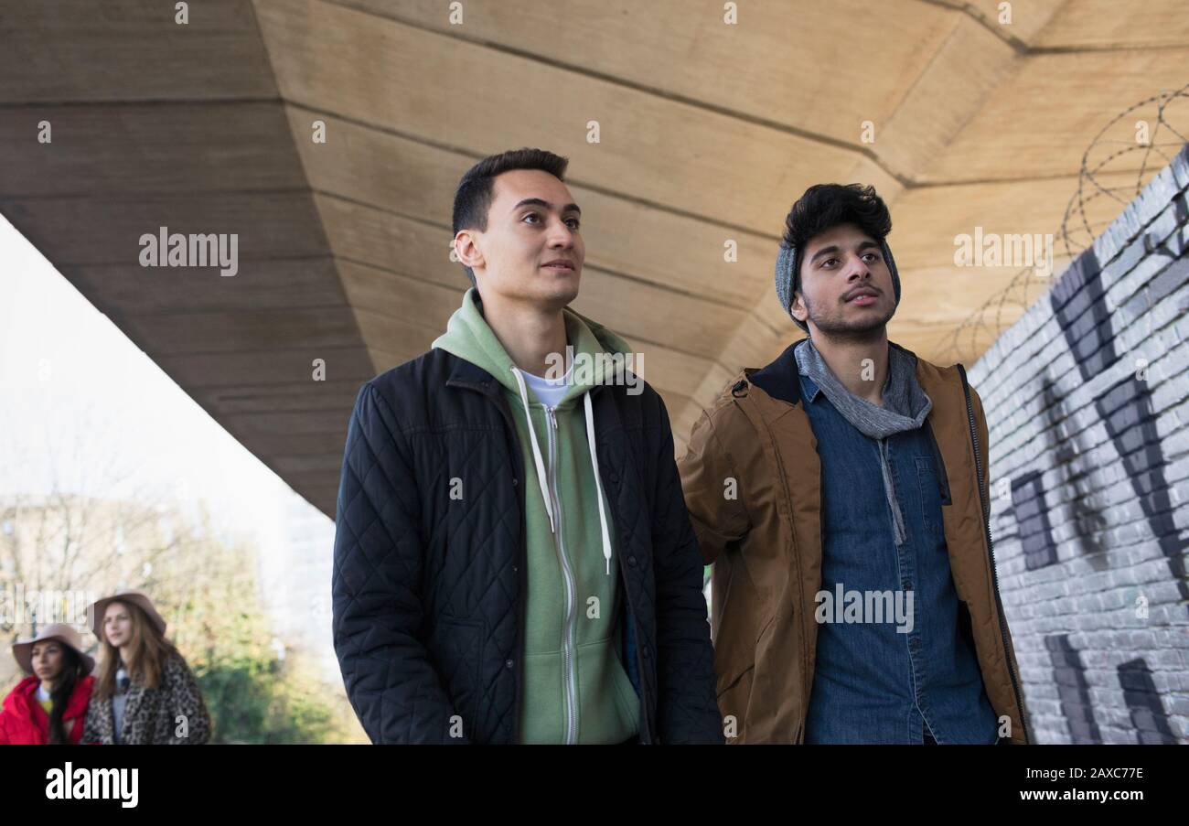 Young man walking up on hi-res stock photography and images - Alamy