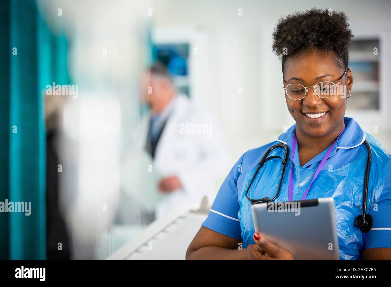 Female nurse using digital tablet in hospital Stock Photo
