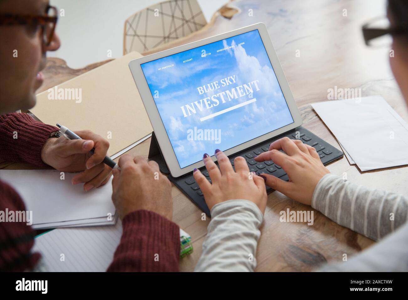 Couple financial planning at digital tablet Stock Photo