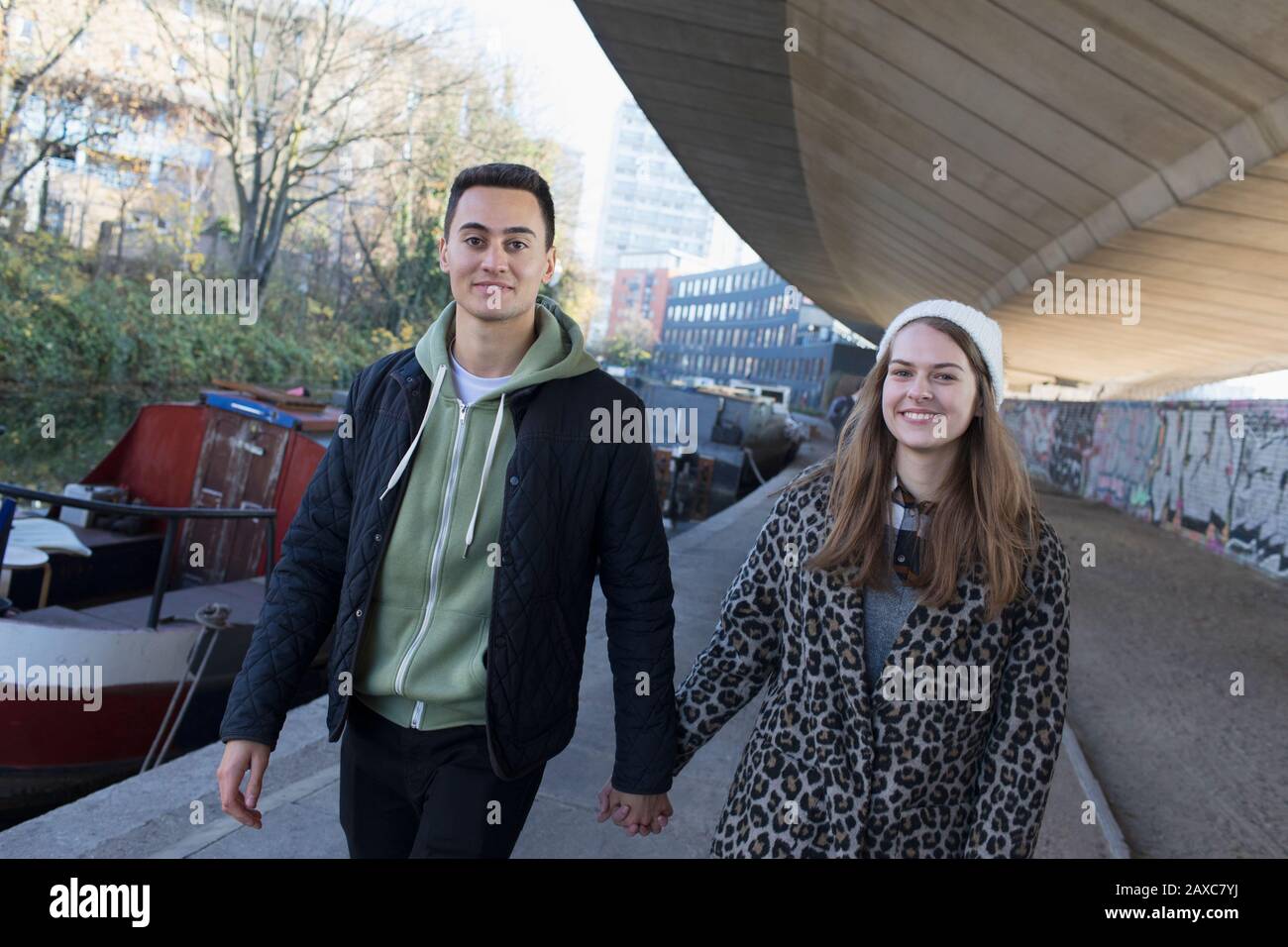 Couple holding hands walking hi-res stock photography and images - Alamy
