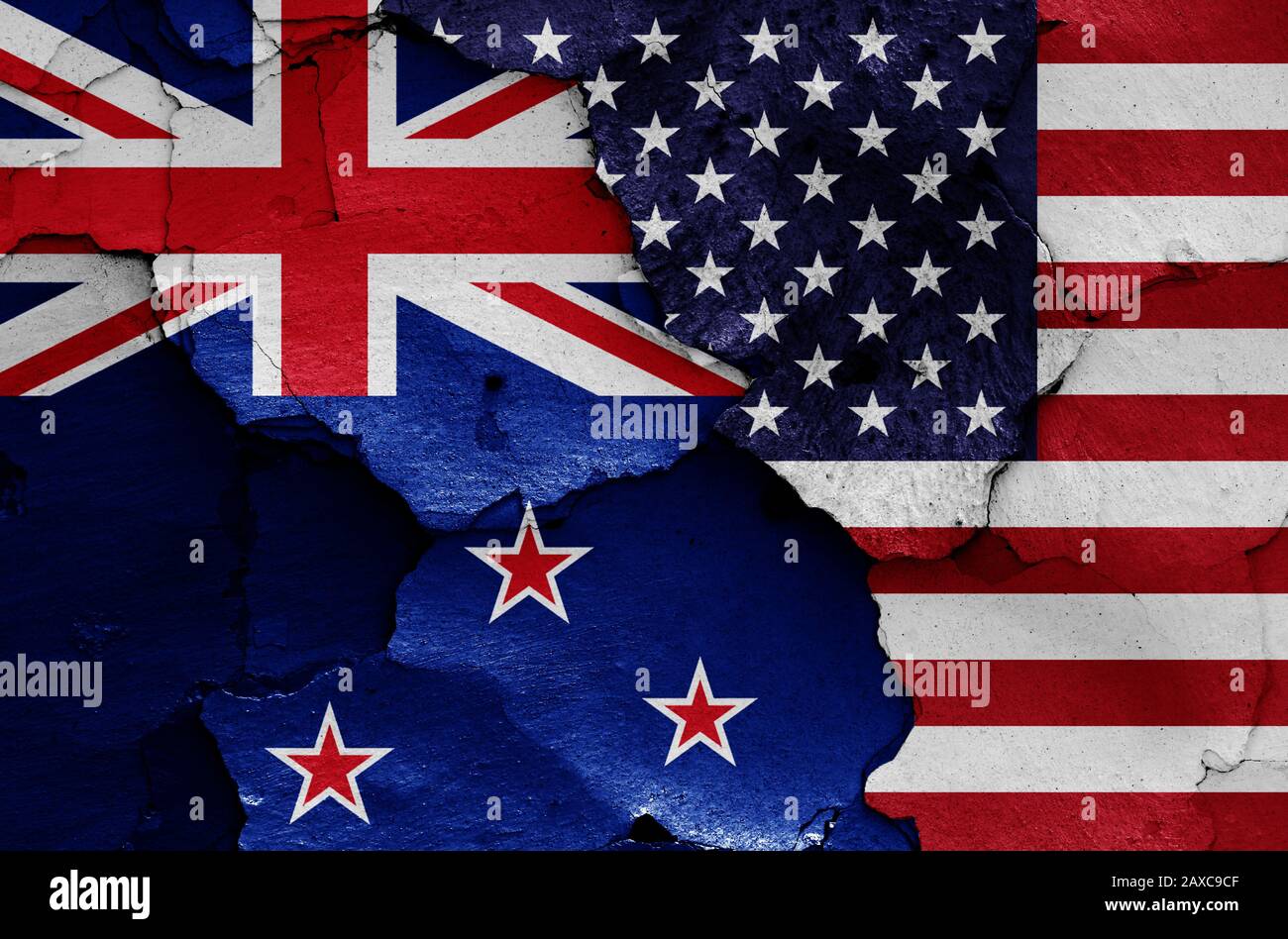 flags of New Zealand and USA painted on cracked wall Stock Photo Alamy