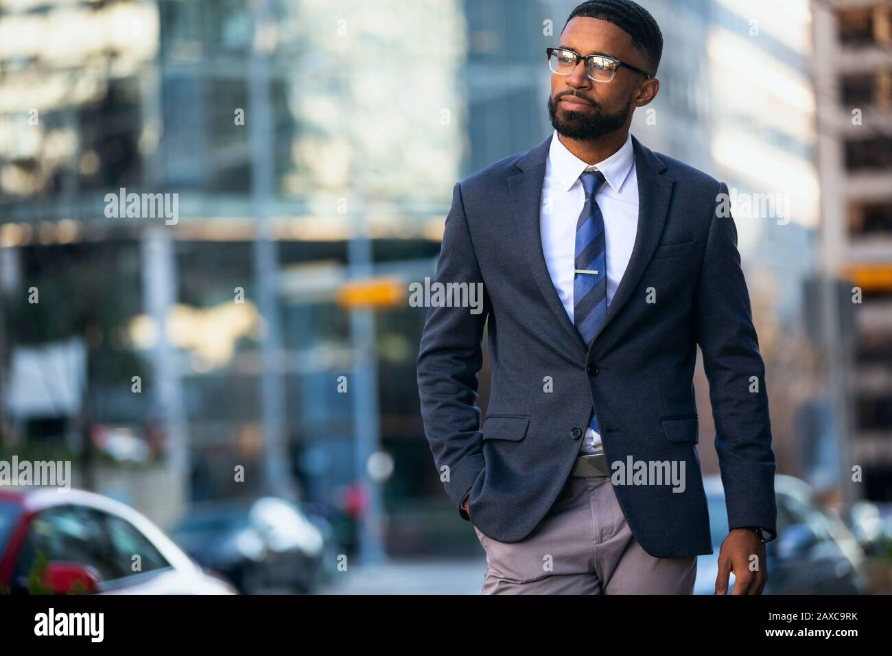 Attractive mixed ethnicity multiethnic business man in modern suit, handsome commercial model with copy space Stock Photo