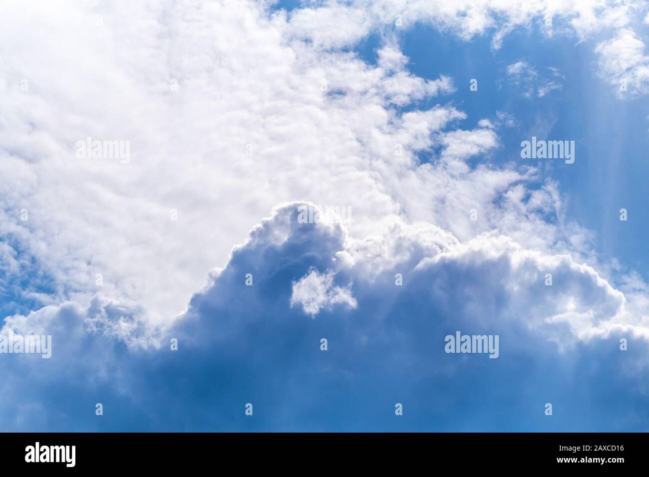 Blue and white cumulus clouds on sky Stock Photo - Alamy