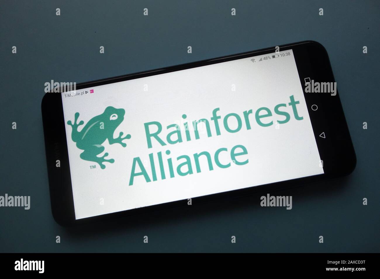Rainforest Alliance logo on smartphone Stock Photo