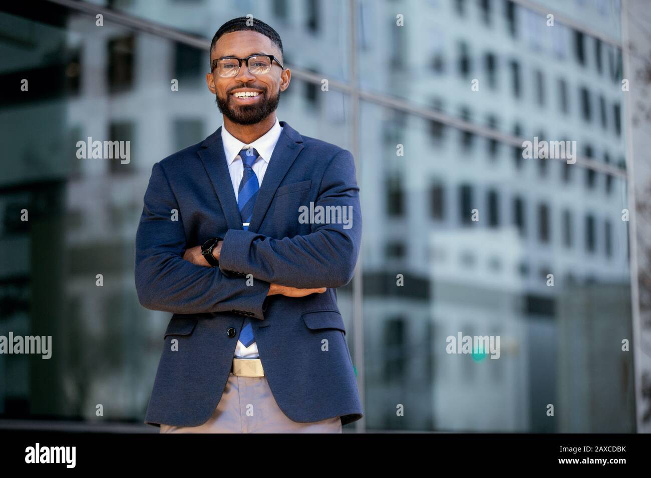 Commercial male model business executive, modern entrepreneur, CEO, company owner and founder, smiling cheerful and successful Stock Photo