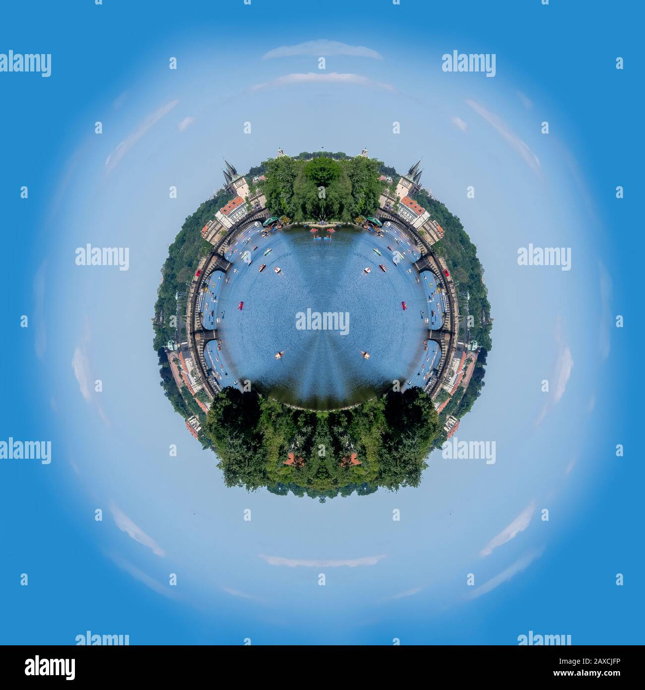 Tiny planet with water, boats, trees and a bridge Stock Photo
