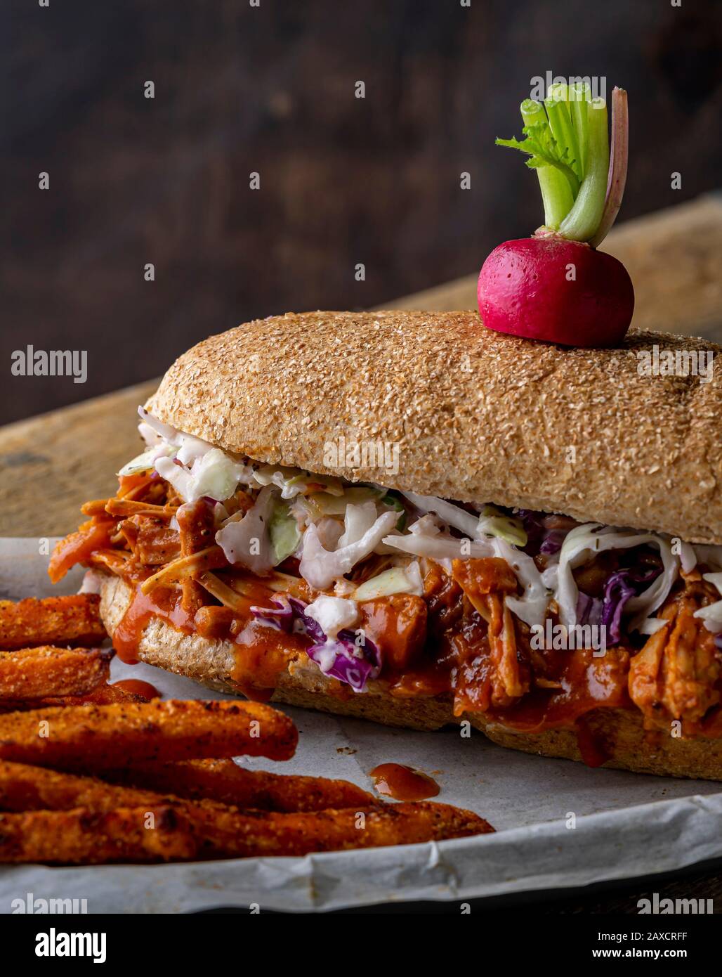 Vegan sandwich. Whole wheat hoagie bread with BBQ jackfruit and