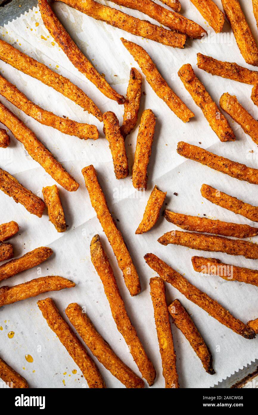 Oven baked sweet potato fries Stock Photo - Alamy