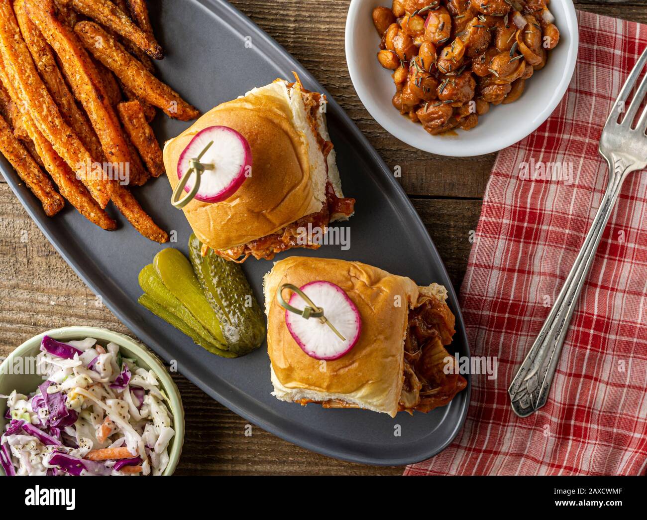 Vegan jackfruit barbecue sliders with BBQ baked beans, oven baked