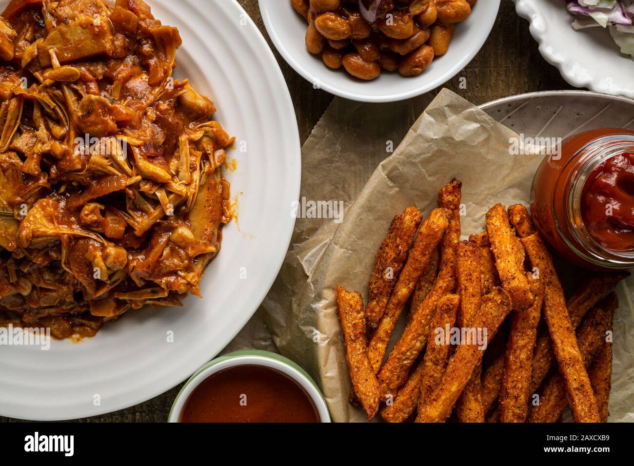 Vegan BBQ plate. Jackfruit barbecued, Southern style baked beans