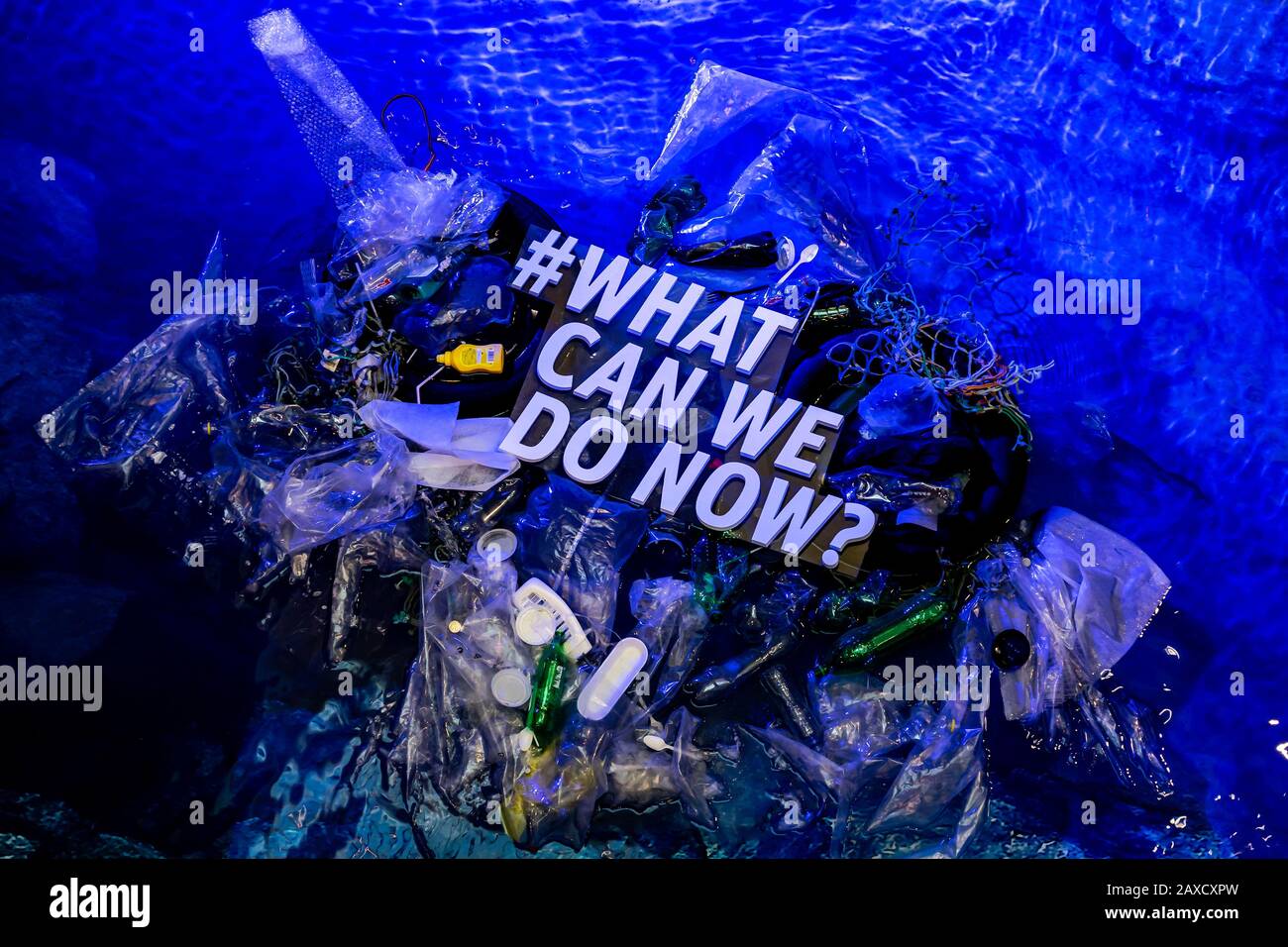 What can we do now ? hashtag on a sea pollution composition concept . Stock Photo