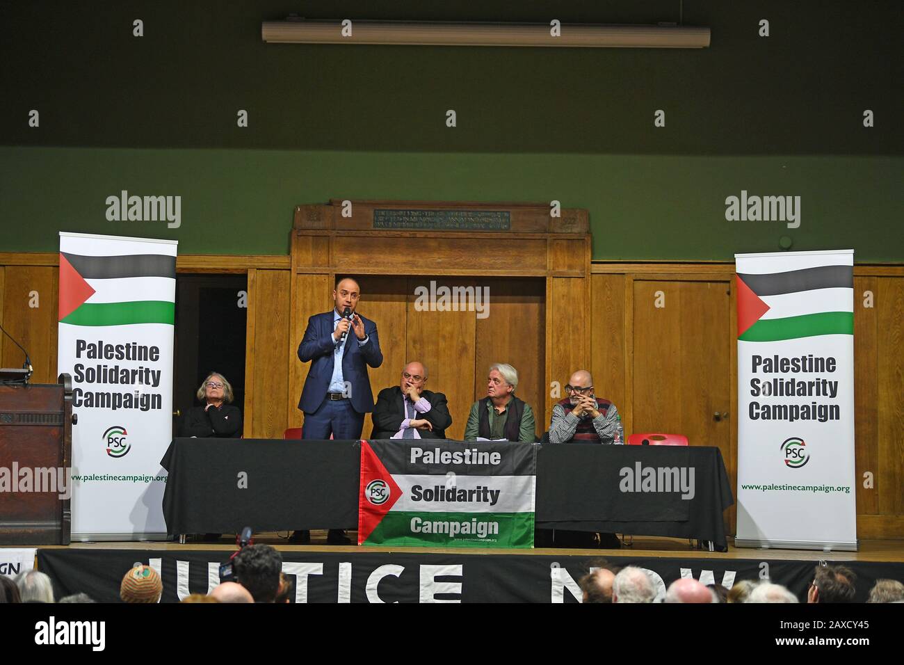 Ambassador Husam Zomlot (second left), Head of Palestinian Mission to the UK, speaking at the Exist, Resist, Return: No to Trump???s deal! organised by the Palestine Solidarity Campaign, at Conway Hall in London. Stock Photo