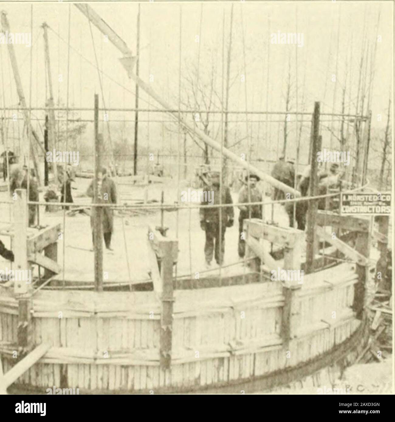 Engineering and Contracting . ? fry^-. Fig. 4. View of Completed Forms Shortly After They Had Begun to Move.The Jacking Forms Are Also Shown. move. The jacks which accomplishe.l the ver- lowering, but there were no records of wheretical movement of the forms are shown at each the new mains and the old mains were con-voke. exterior scaffold was attached to i tilnl Thf mains that were on the cross 462 Engineering and Contractino; ol. XLI. No. 16. streets were laid about ten years after themain we were working upon. It seems thatto save a httle money the consulting engineerhad ordered every othe Stock Photo