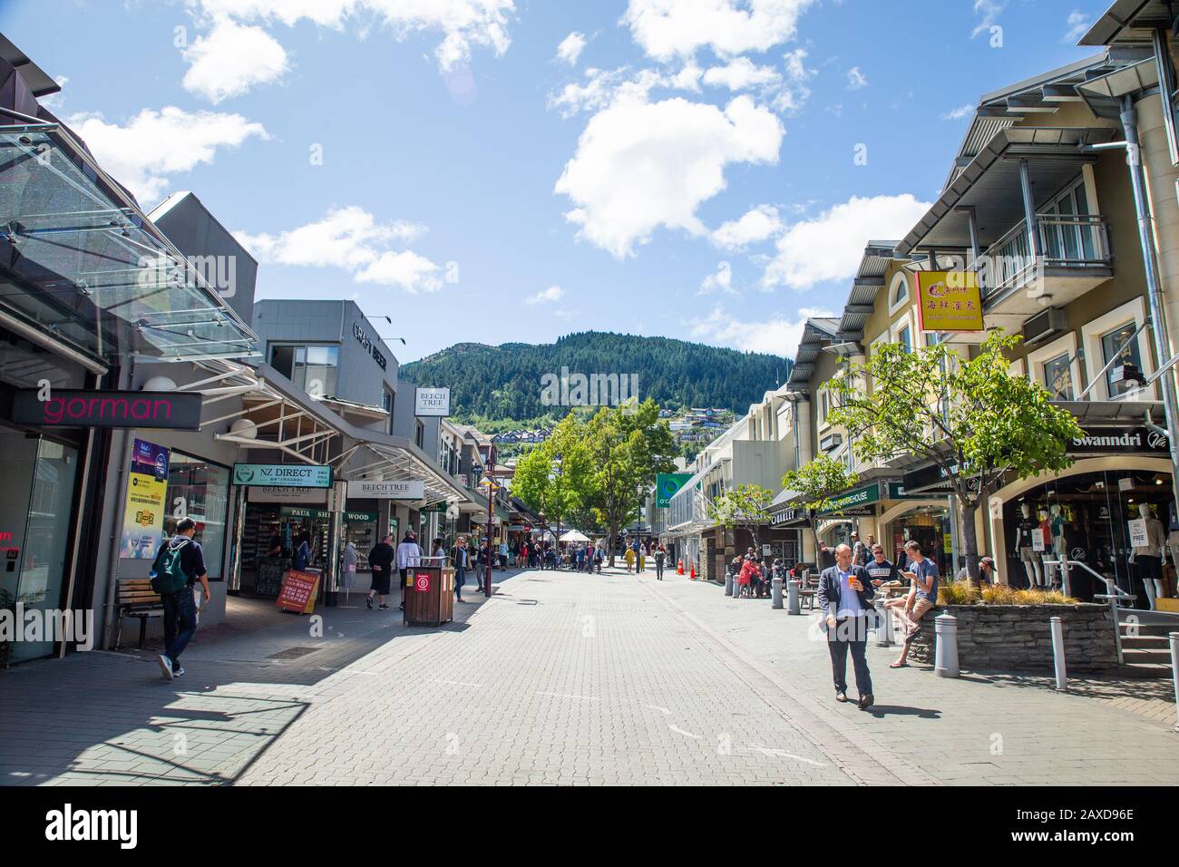 Queenstown New Zealand.City Streets of Queenstown South Island New Zealand a Popular Travel Tourism Destination. Busy Streets of Tourist Town. Stock Photo