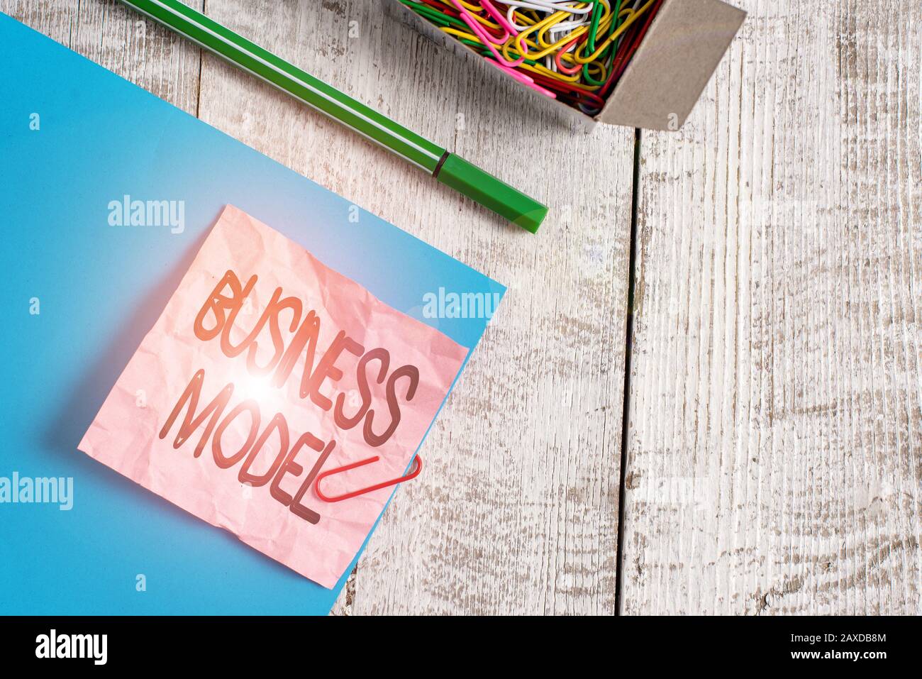 Writing note showing Business Model. Business concept for strategy that ...