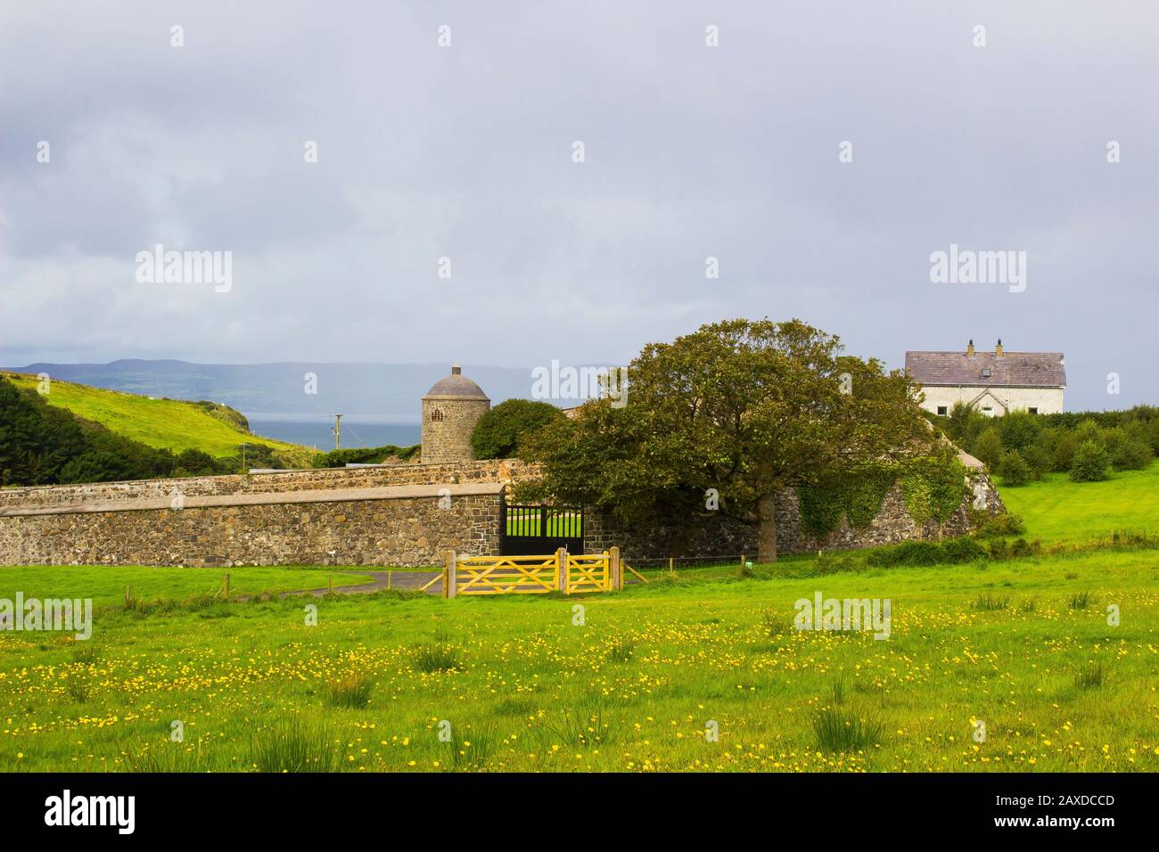 Farm labourer's cottages beside the walled garden at Mussenden House on the Downhill Demesne on the north coast of County Londonderry in Northern Irel Stock Photo