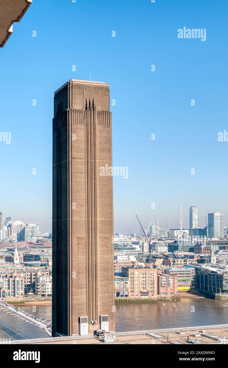 The old Bankside Power Station chimney, 99 metres tall, was designed by Giles Gilbert Scott in the early 1950s and is now part of Tate Modern. Stock Photo
