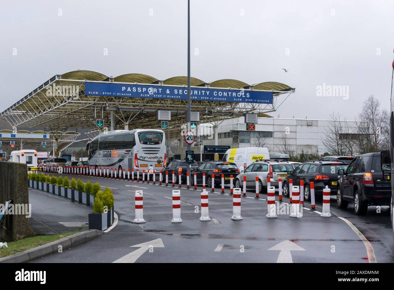Cars queue for Passport & Security Controls on the English side of the Channel Tunnel at Folkestone. Stock Photo