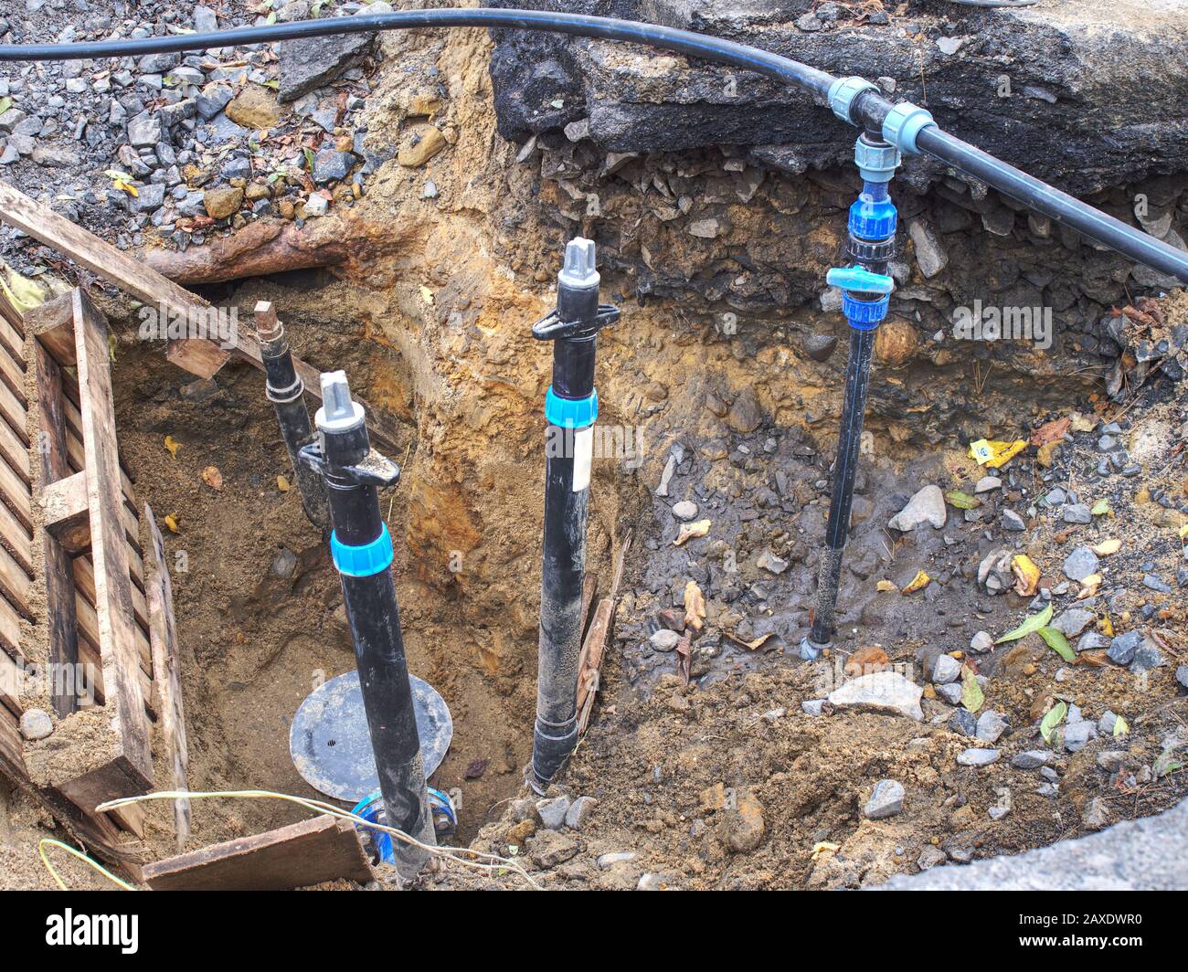 Reneval potable water system in the city. Laying plastic water pipes at the corner of a flat