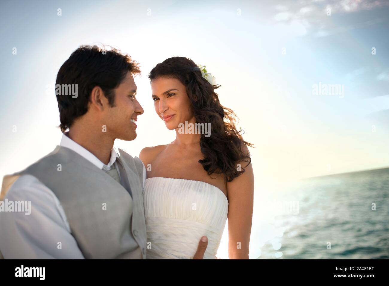 Happy newlywed couple tenderly hi-res stock photography and images - Alamy
