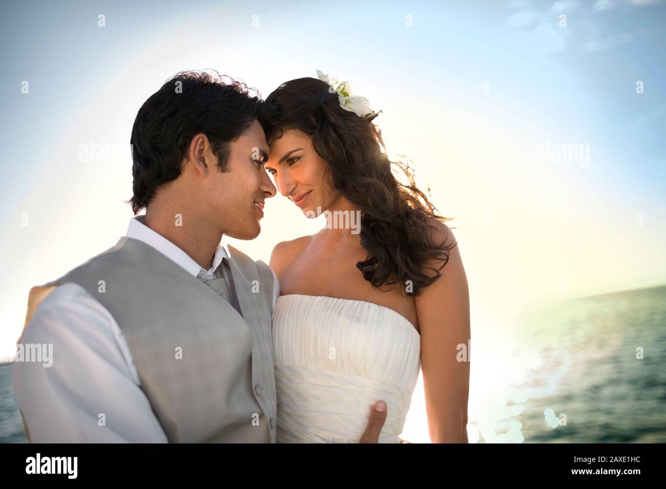 Happy newlywed couple tenderly hi-res stock photography and images - Alamy