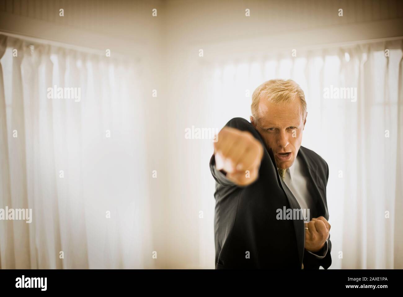 Businessman fighting inside hi-res stock photography and images - Alamy