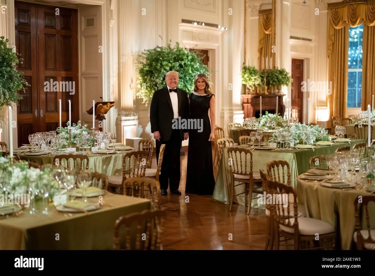 U.S President Donald Trump and First Lady Melania Trump pose together for a portrait prior to the Governors Ball in the East Room of the White House February 9, 2020 in Washington, DC. Stock Photo