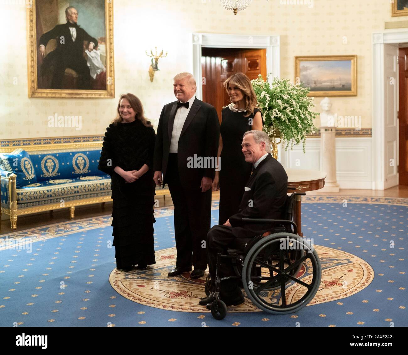 U.S President Donald Trump and First Lady Melania Trump pose with Texas Governor Greg Abbott and his wife Cecilia Abbott, left, for a portrait prior to the Governors Ball in the Blue Room of the White House February 9, 2020 in Washington, DC. Stock Photo