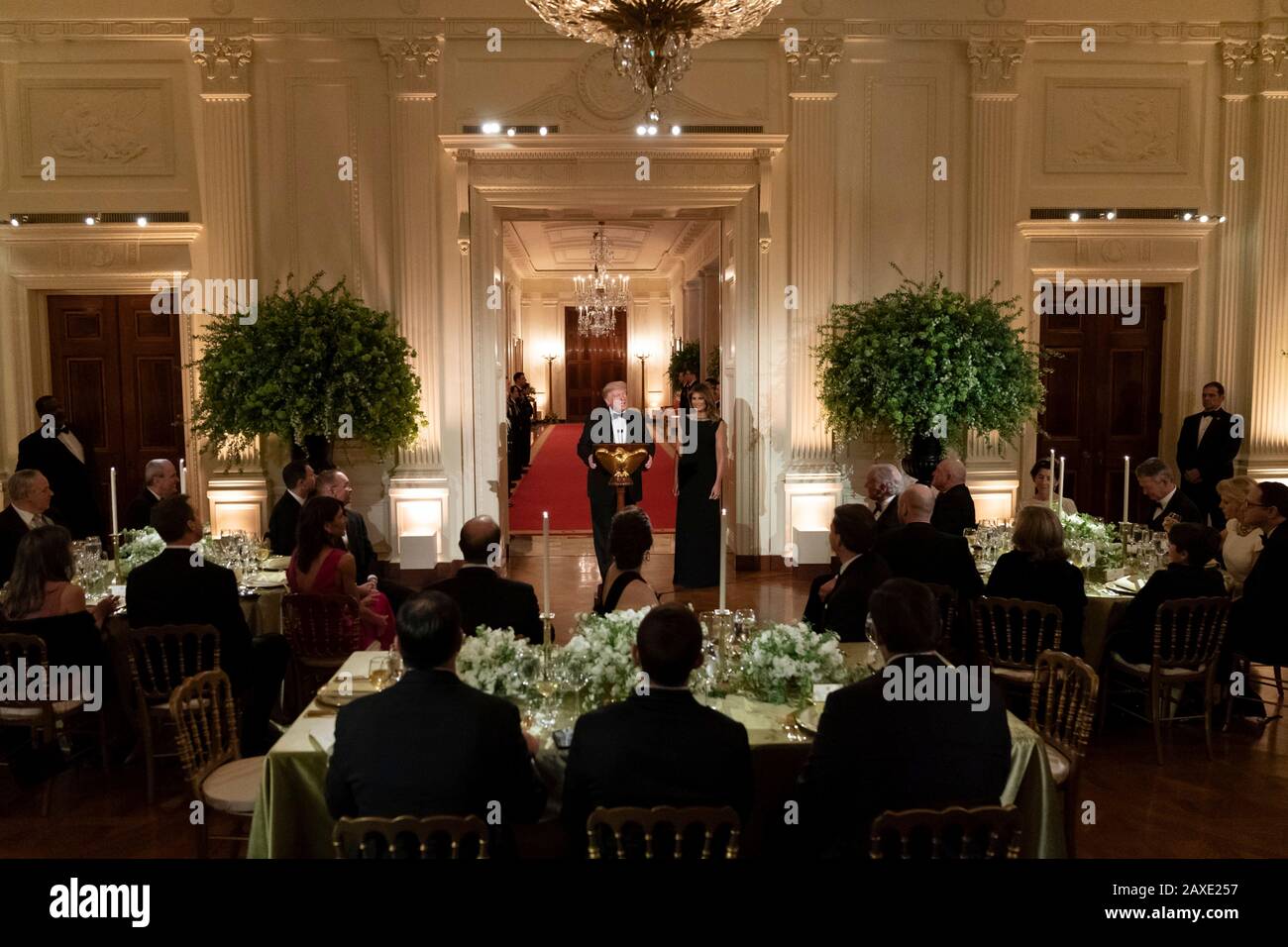 U.S President Donald Trump and First Lady Melania Trump address remarks during the Governors Ball in the East Room of the White House February 9, 2020 in Washington, DC. Stock Photo