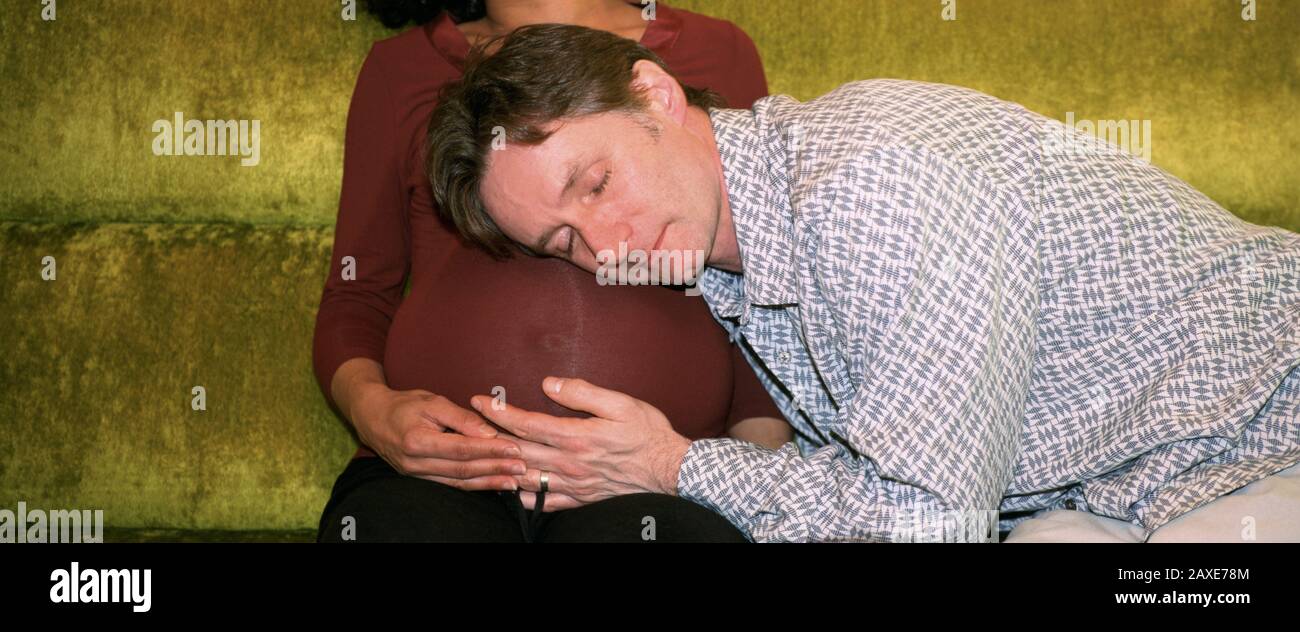 USA, Mid adult man with his pregnant wife Stock Photo