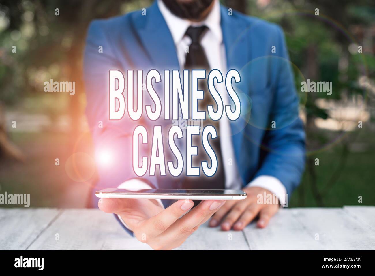 Conceptual Hand Writing Showing Business Cases Concept Meaning Undertaking On The Basis Of Its Expected Commercial Benefit Businessman With Mobile Ph Stock Photo Alamy