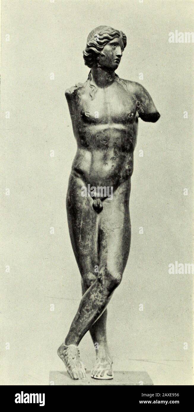 Greek bronzes . Fig. 27.—Marble Statue. Apollo Sauroctonos. Louvre. foil to the delicate modelling of the bodily forms. And when we thinkof it, that was a great change from the treatment of drapery in theParthenon sculptures, where the presence of drapery is never accidental,but always shares in the dignity and solemnity of the figure. Even in 68 GREEK BRONZES the draped figures of Praxiteles as in the Muses of Mantinea, we see thathe had created a new type which differs from that of the Parthenon inas-. FiG. 28.—Apollo. From Tkessaly. British Museu?n. much as it is a special study of a draped Stock Photo