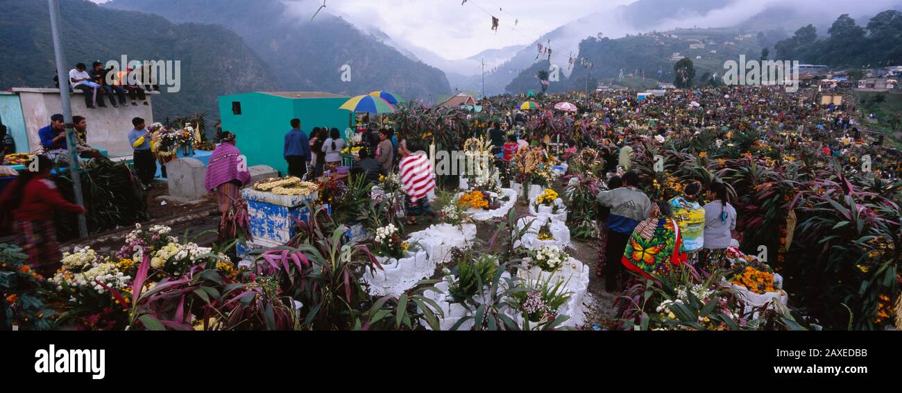 High Angle View Of A Group Of People In A Cemetery, All Saint's Day, Zunil, Guatemala Stock Photo