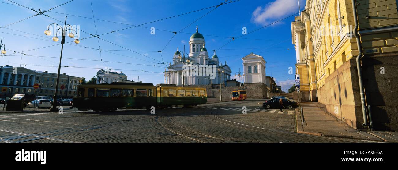 Tram Moving On A Road, Senate Square, Helsinki, Finland Stock Photo