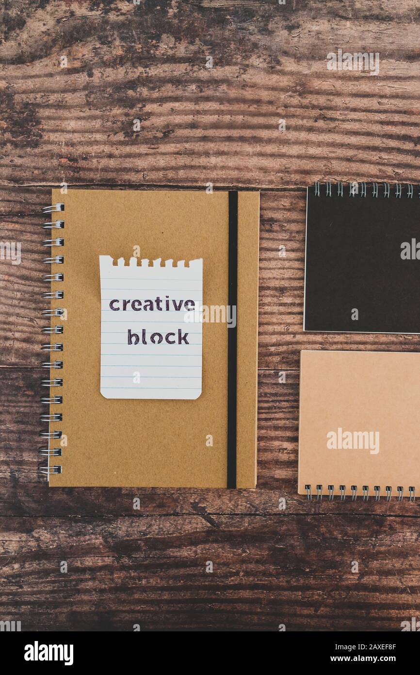 creative block or writer's block conceptual still-life, notepads on ...